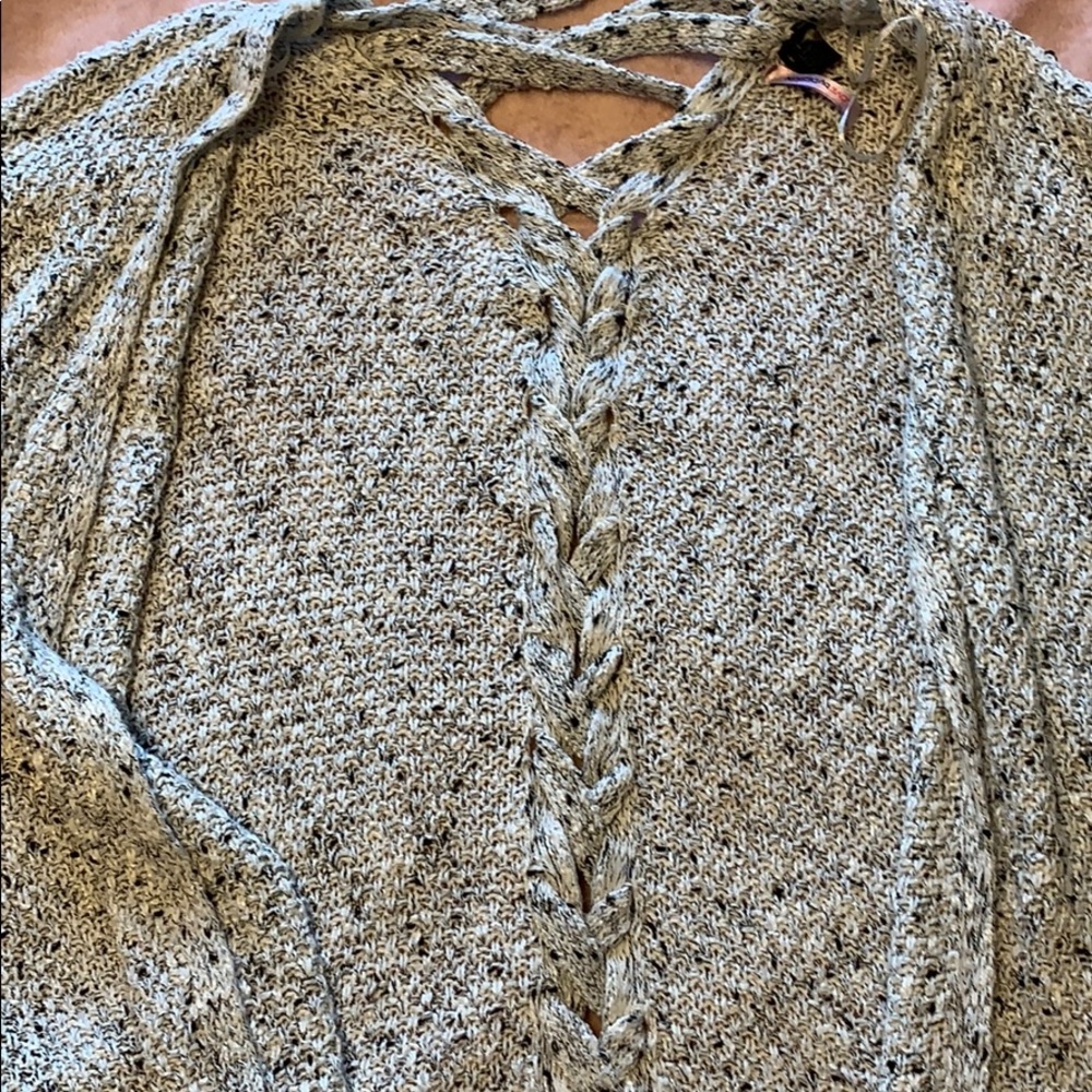 grey white and black cardigan